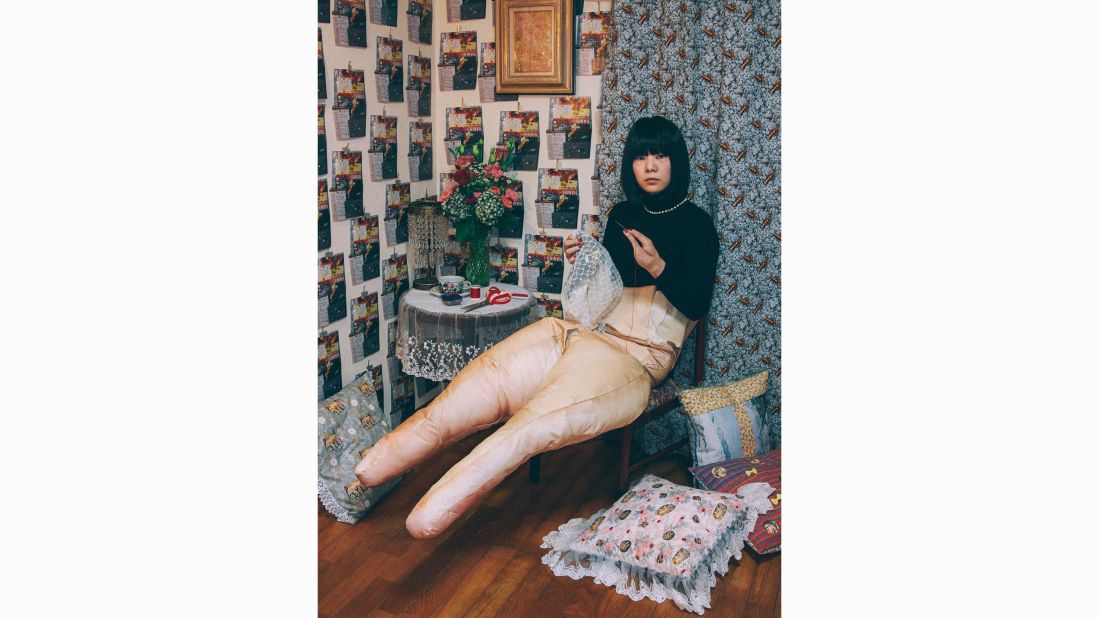 Katayama wears a bob-style wig in her shots. "If somebody says 'Oh, is it a wig,' when I wear the wig to form a made-up self, the importance of the difference between artificial and natural becomes ambiguous."