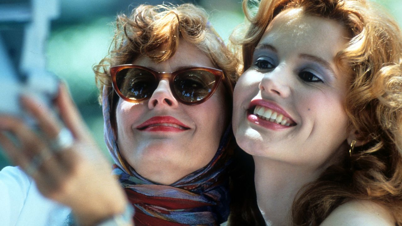 Susan Sarandon and Geena Davis taking Polaroid of themselves in a scene from the film 'Thelma & Louise', 1991. (Photo by Metro-Goldwyn-Mayer/Getty Images)