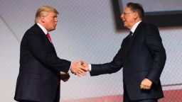 US President Donald Trump shakes hands with National Rifle Association (NRA) President Wayne LaPierre (R) during the NRA Leadership Forum in Atlanta, GA, April 28, 2017, with NRA-ILA Executive Director Chris Cox (L). / AFP PHOTO / JIM WATSON        (Photo credit should read JIM WATSON/AFP/Getty Images)