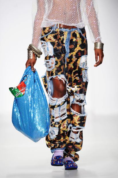 London designer Ashish showed eye-catching sequined bags modeled after plastic grocery bags. 