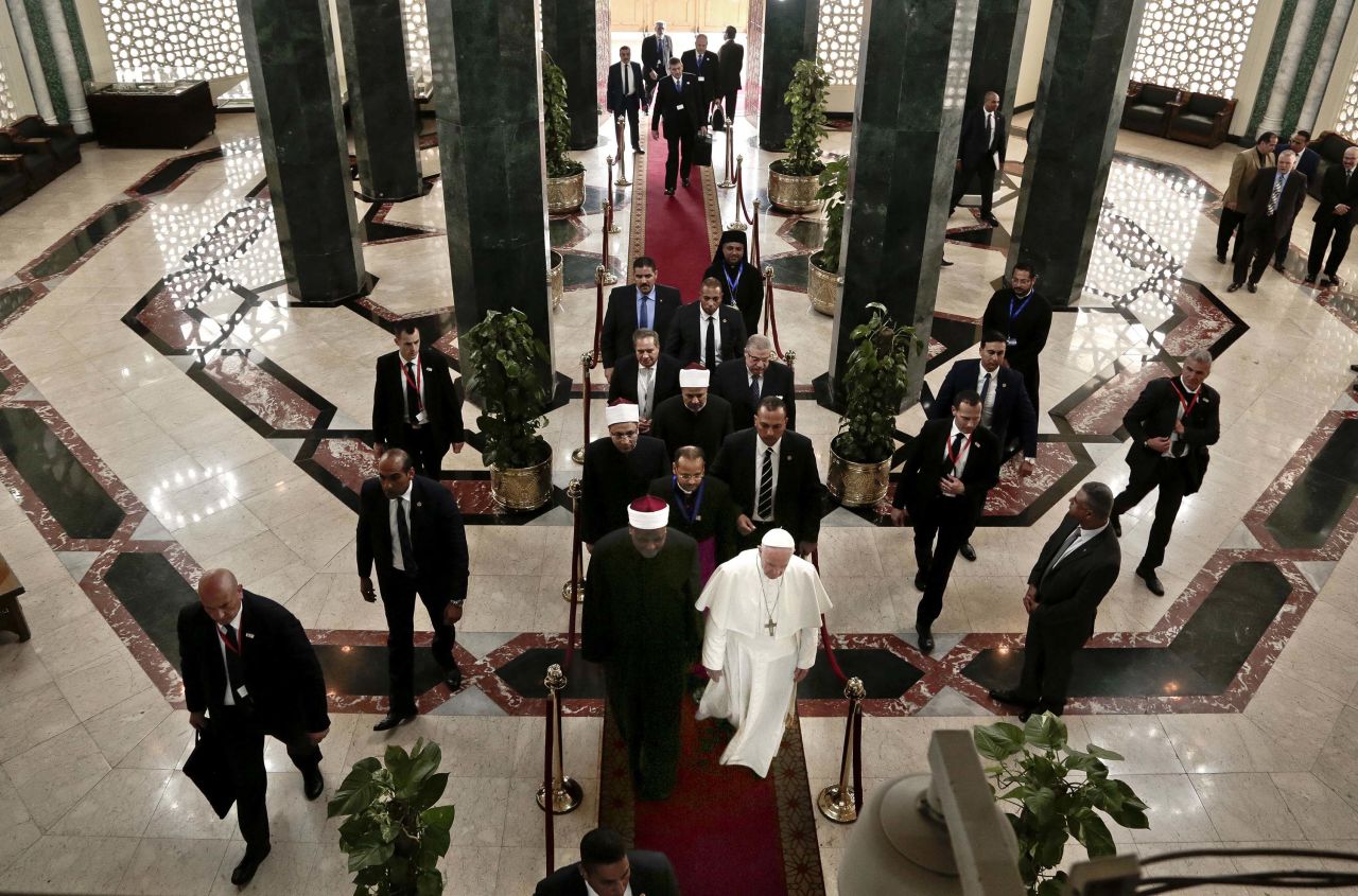 The Pope arrives for his meeting with the Grand Imam.