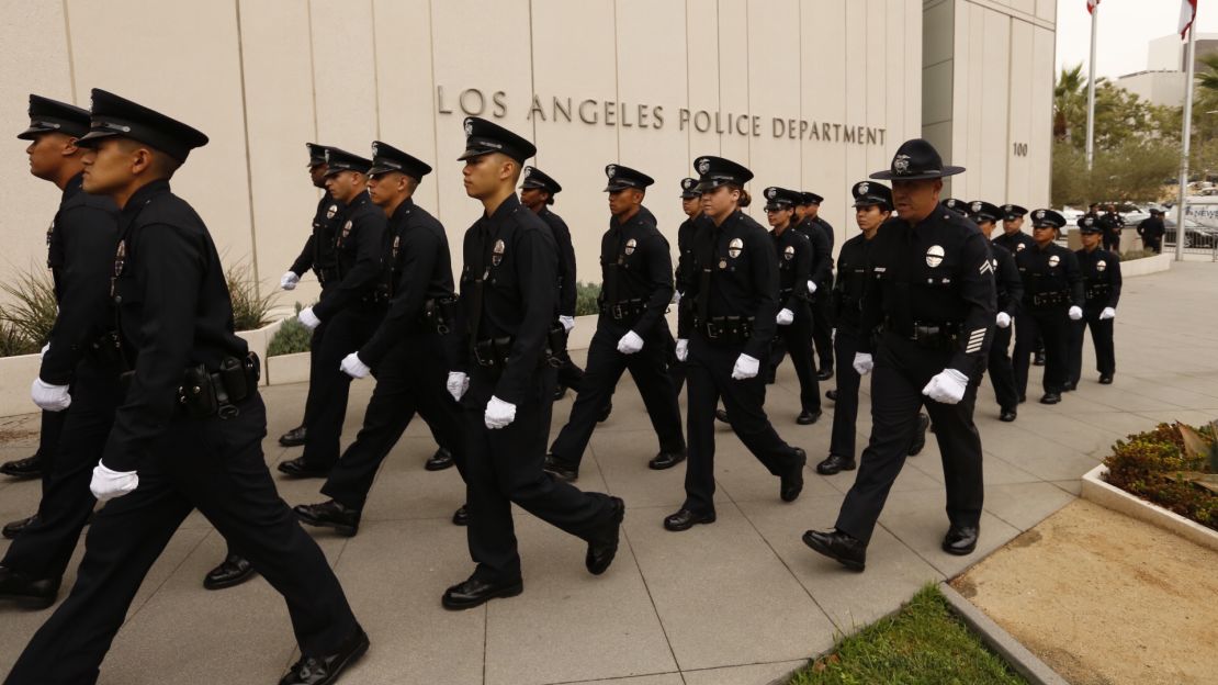 LAPD recruits march in processional as the Los Angeles Police Department holds a graduation ceremony led by LAPD Chief Charlie Beck and Mayor Eric Garcetti. 