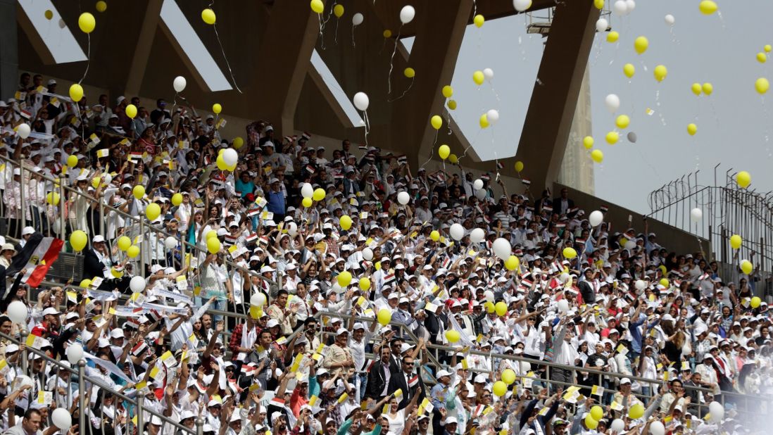 The faithful cheer and celebrate at the April 29 Mass as Pope Francis sends a message of tolerance and co-existence.