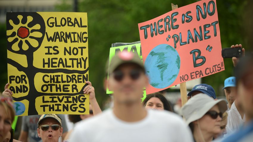 WASHINGTON, DC - APRIL 29:  People gather near the U.S. Capitol for the People's Climate Movement before marching to the White House to protest President Donald Trump's enviromental policies April 29, 2017 in Washington, DC. Demonstrators across the country are gathering to demand  a clean energy economy. (Photo by Astrid Riecken/Getty Images)