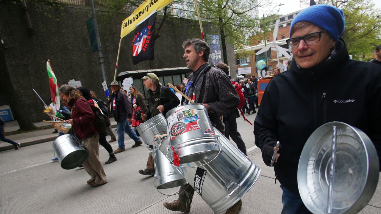 Demonstrators join a climate march in Seattle.