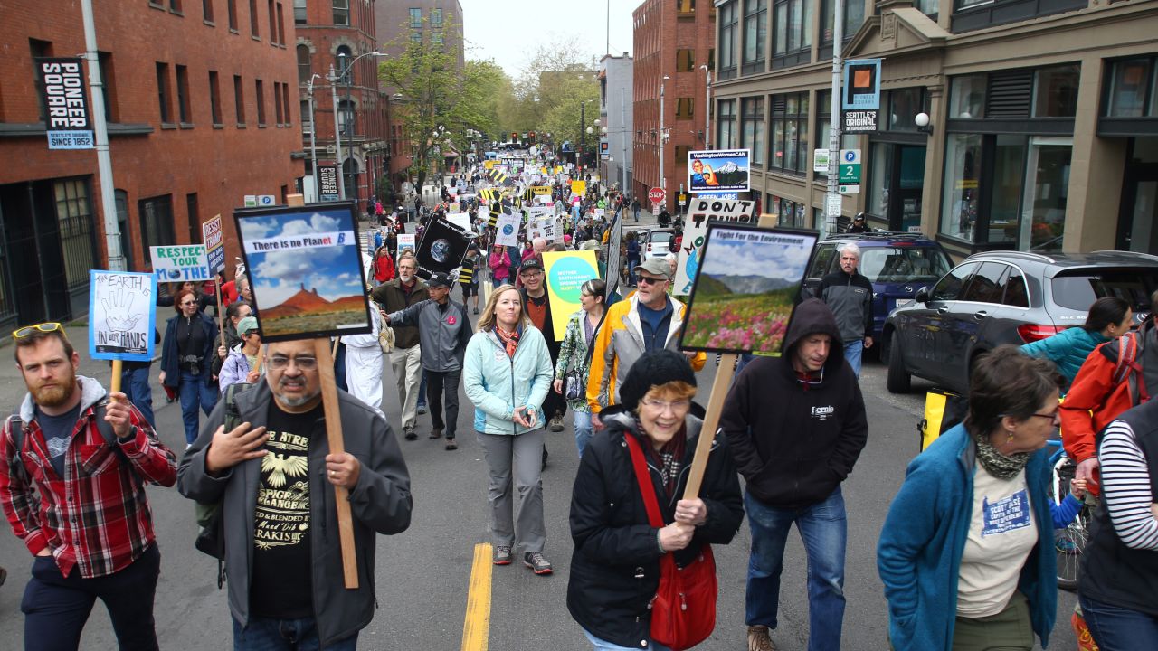 Activists participate in Seattle's march.