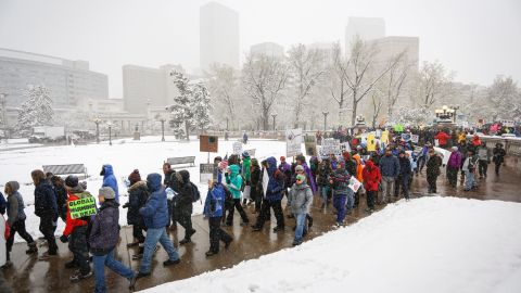 Protesters march in Denver.