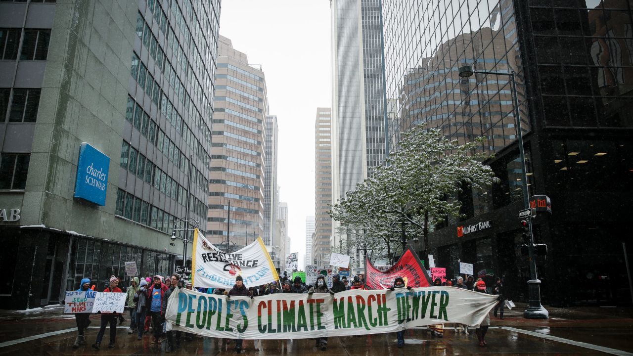 Thousands of protesters march in downtown Denver.