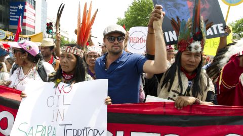 Actor Leonardo DiCaprio marches in Washington with a group of indigenous people from North and South America.