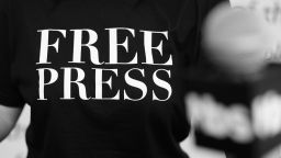 WASHINGTON, DC - APRIL 28:  (EDITOR'S NOTE: This image has been converted to black and white) A person stands at a podium in one of the "Free Press" t shirts handed out during the Full Frontal With Samantha Bee's Not The White House Correspondents' Dinner activation at the Newseum on April 28, 2017 in Washington City. 26966_005  (Photo by Tasos Katopodis/Getty Images)