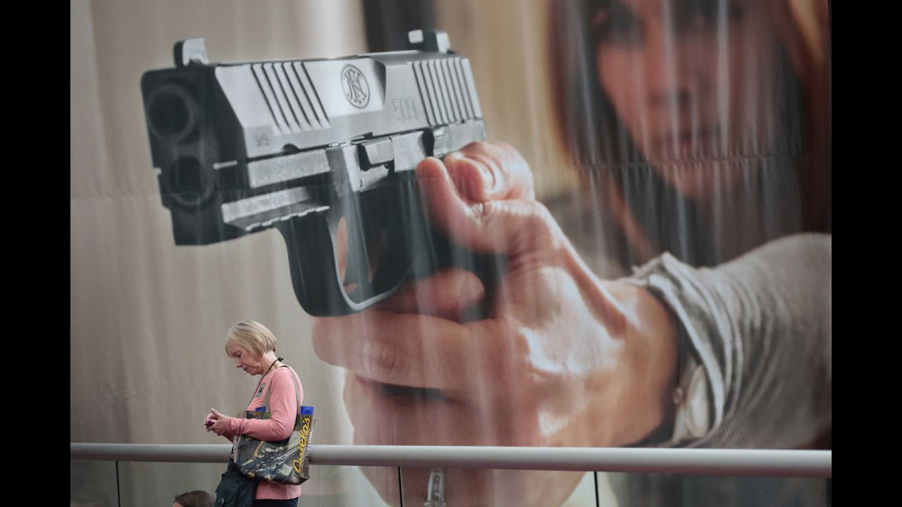 A woman attends the annual meetings of the National Rifle Association on Saturday, April 29. The convention is taking place in Atlanta through the weekend.