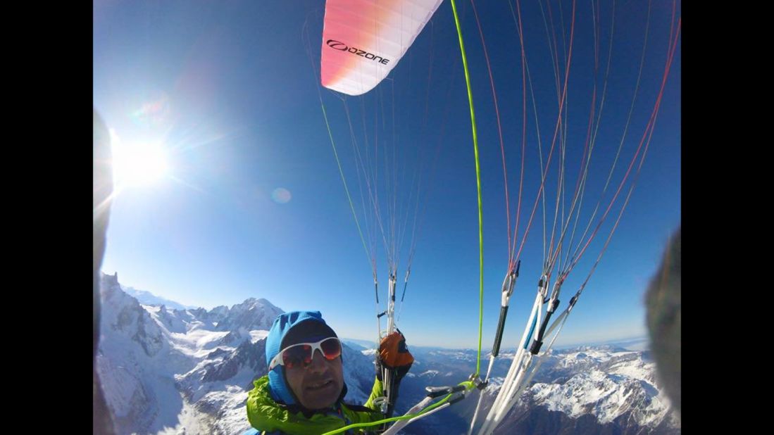 After climbing the Aiguille Verte, a mountain in the French Alps, Steck prepares to parachute down in December 2016. 