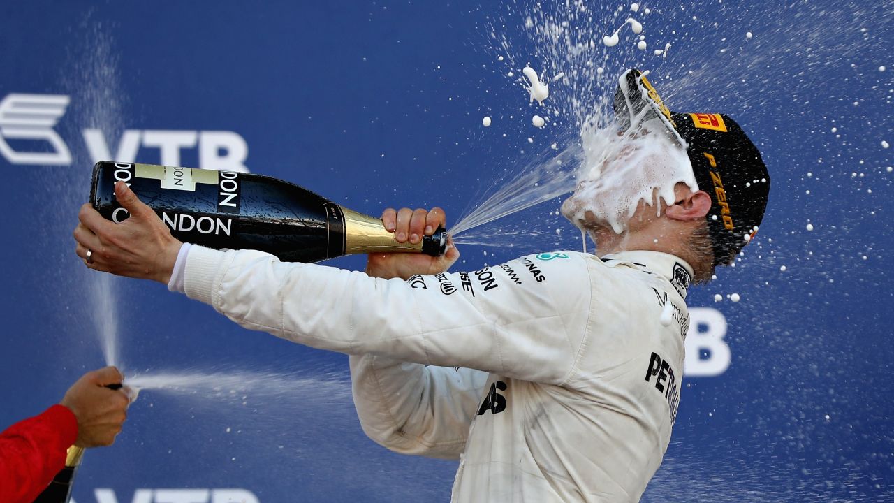 Race winner Valtteri Bottas celebrates on the podium of the Russian Grand Prix.