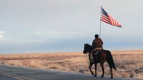 Duane Ehmer rides out to confront the press after the killing of Lavoy Finicum. Film still from "No Man's Land."