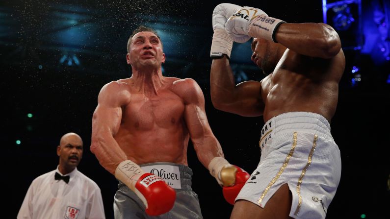 Anthony Joshua uppercuts Wladimir Klitschko during their heavyweight title fight in London on Saturday, April 29. <a href="index.php?page=&url=http%3A%2F%2Fwww.cnn.com%2F2017%2F04%2F29%2Fsport%2Fanthony-joshua-wladimir-klitschko-world-heavyweight-title-fight%2F" target="_blank">Joshua stopped Klitschko</a> in the 11th round, cementing his status as the world's premier heavyweight. 