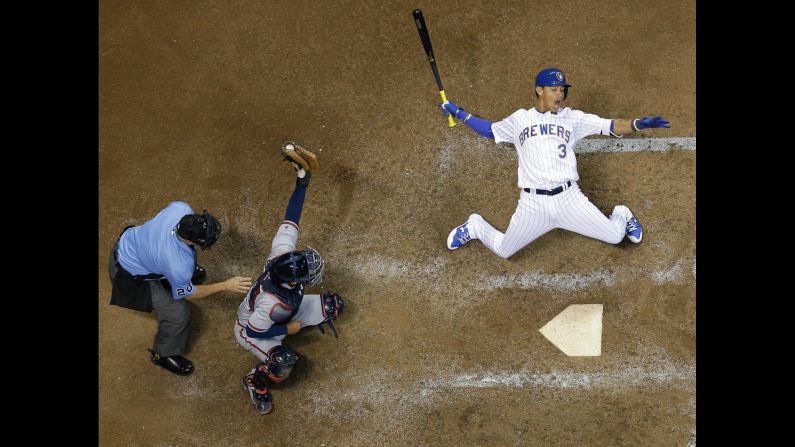 Milwaukee's Orlando Arcia moves out of the way of a pitch during a Major League Baseball game against Atlanta on Friday, April 28.