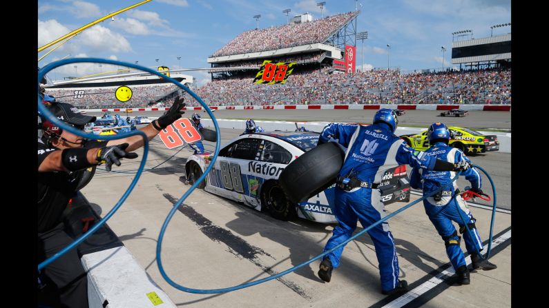 The pit crew for Dale Earnhardt Jr. works on his car during a Cup Series race in Richmond, Virginia, on Sunday, April 30. Earnhardt <a href="index.php?page=&url=http%3A%2F%2Fwww.cnn.com%2F2017%2F04%2F25%2Fsport%2Fdale-earnhardt-jr-to-retire-from-nascar-cup-series%2F" target="_blank">is retiring</a> at the end of the season. 