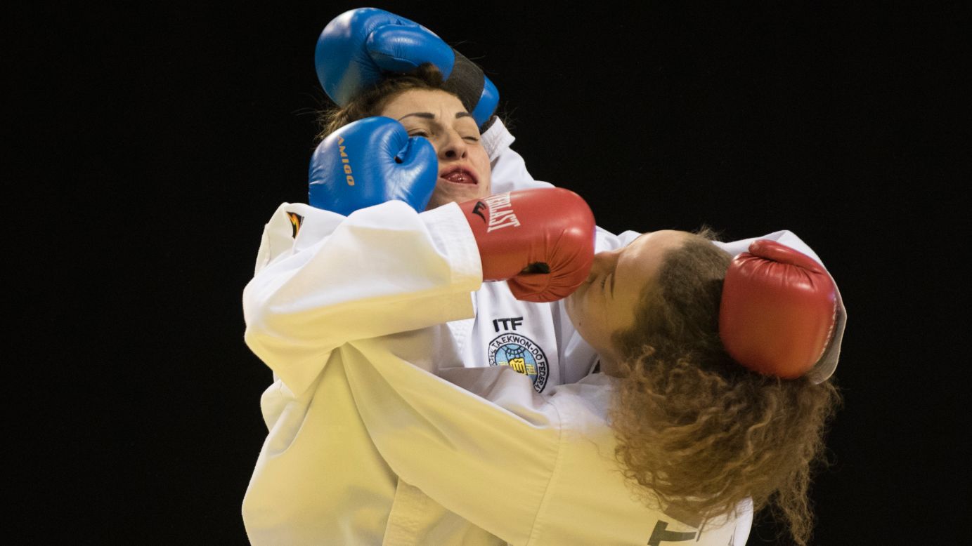 Ukraine's Madonna Baranova, left, competes against Russia's Olga Levina during the European Taekwondo Championships on Saturday, April 29.