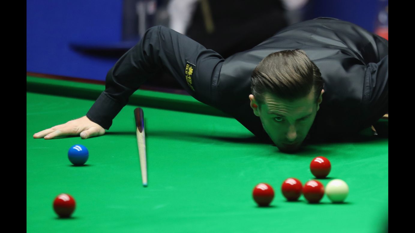 Mark Selby studies a shot Sunday, April 30, during the final of the World Snooker Championship.