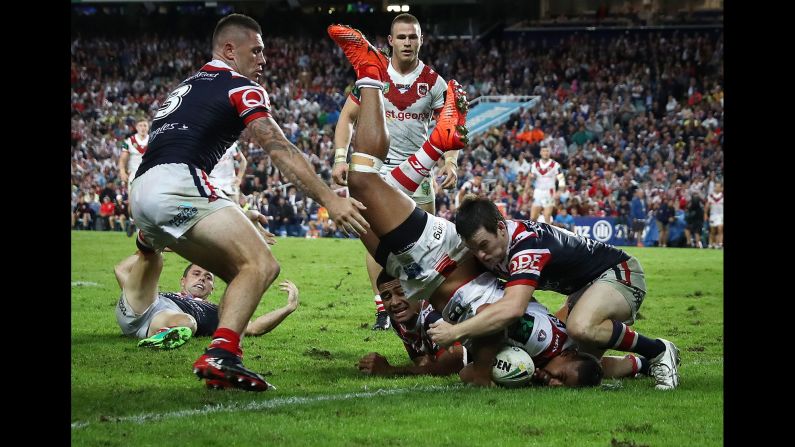 Nene Macdonald scores a try for the St. George Illawarra Dragons during a National Rugby League match against the Sydney Roosters on Tuesday, April 25. Sydney won 13-12.