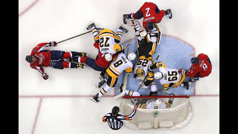 Pittsburgh goalie Marc-Andre Fleury (No. 29) makes a save during a goalmouth scramble in Washington on Thursday, April 27. Fleury and the Penguins took Game 1 of their second-round playoff series.