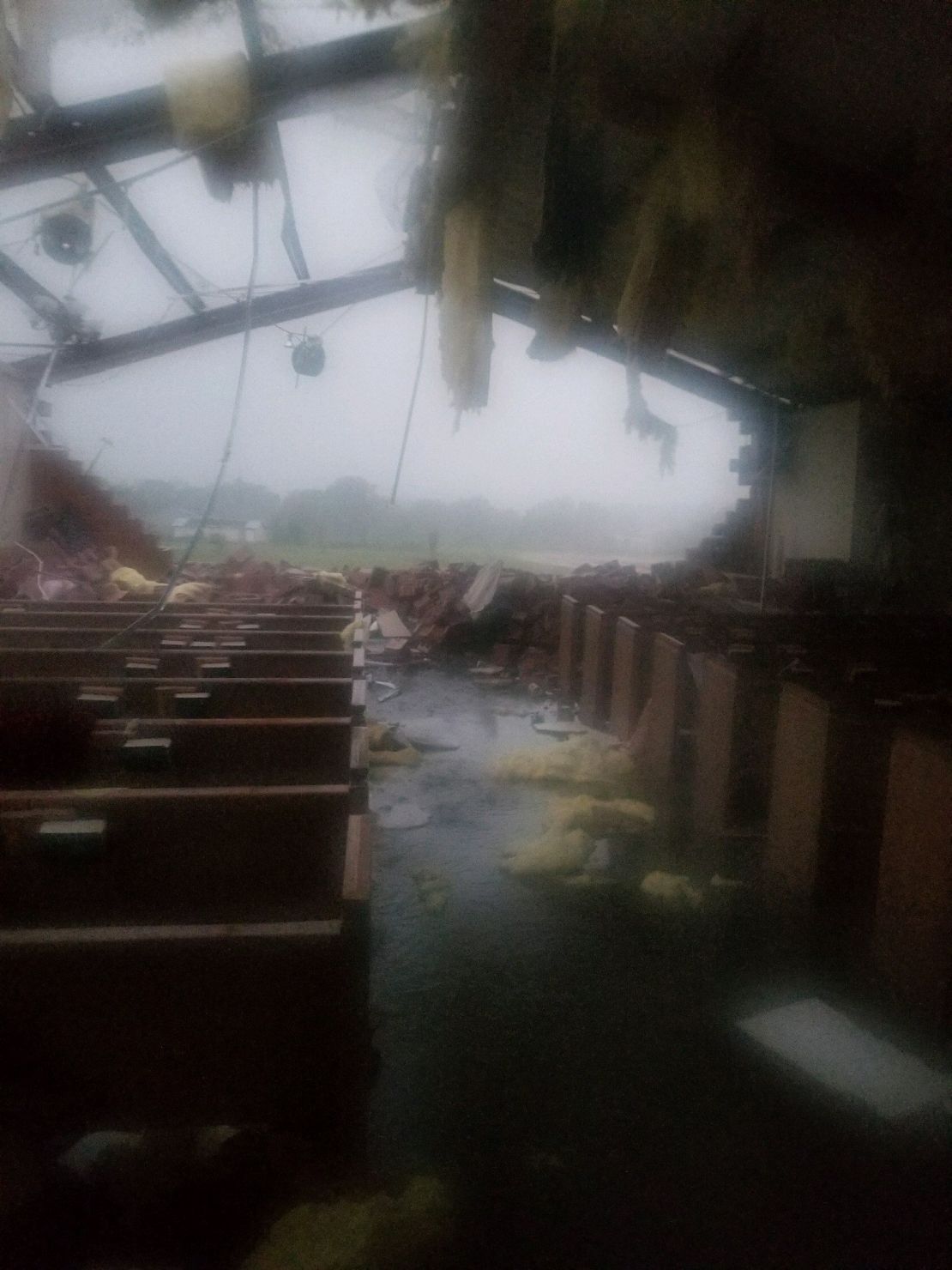 The tornado destruction inside St. John the Evangelist Catholic Church in Emory.