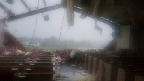 The tornado destruction inside St. John the Evangelist Catholic Church in Emory.