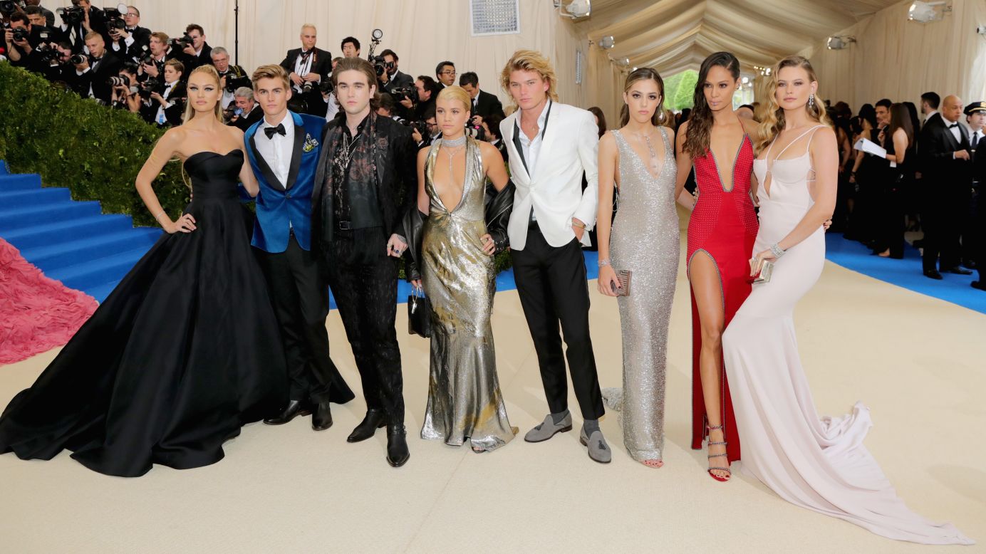 Left to right, Candice Swanepoel, Presley Gerber, Gabriel Kane, Sofia Richie, Jordan Kale Barrett, Joans Smalls and Behati Prinsloo attend the "Rei Kawakubo/Comme des Garcons: Art Of The In-Between" Costume Institute Gala at the Metropolitan Museum of Art on May 1, in New York City.