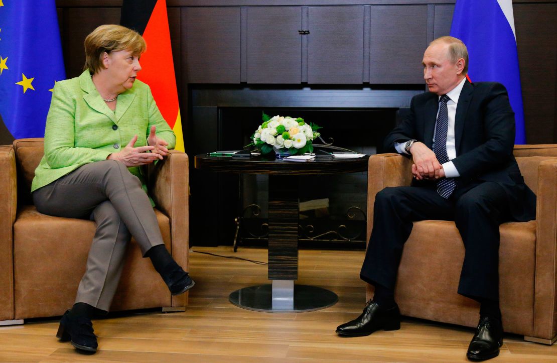 Merkel (L) with Putin at the Bocharov Ruchei residence in Sochi on Tuesday. 