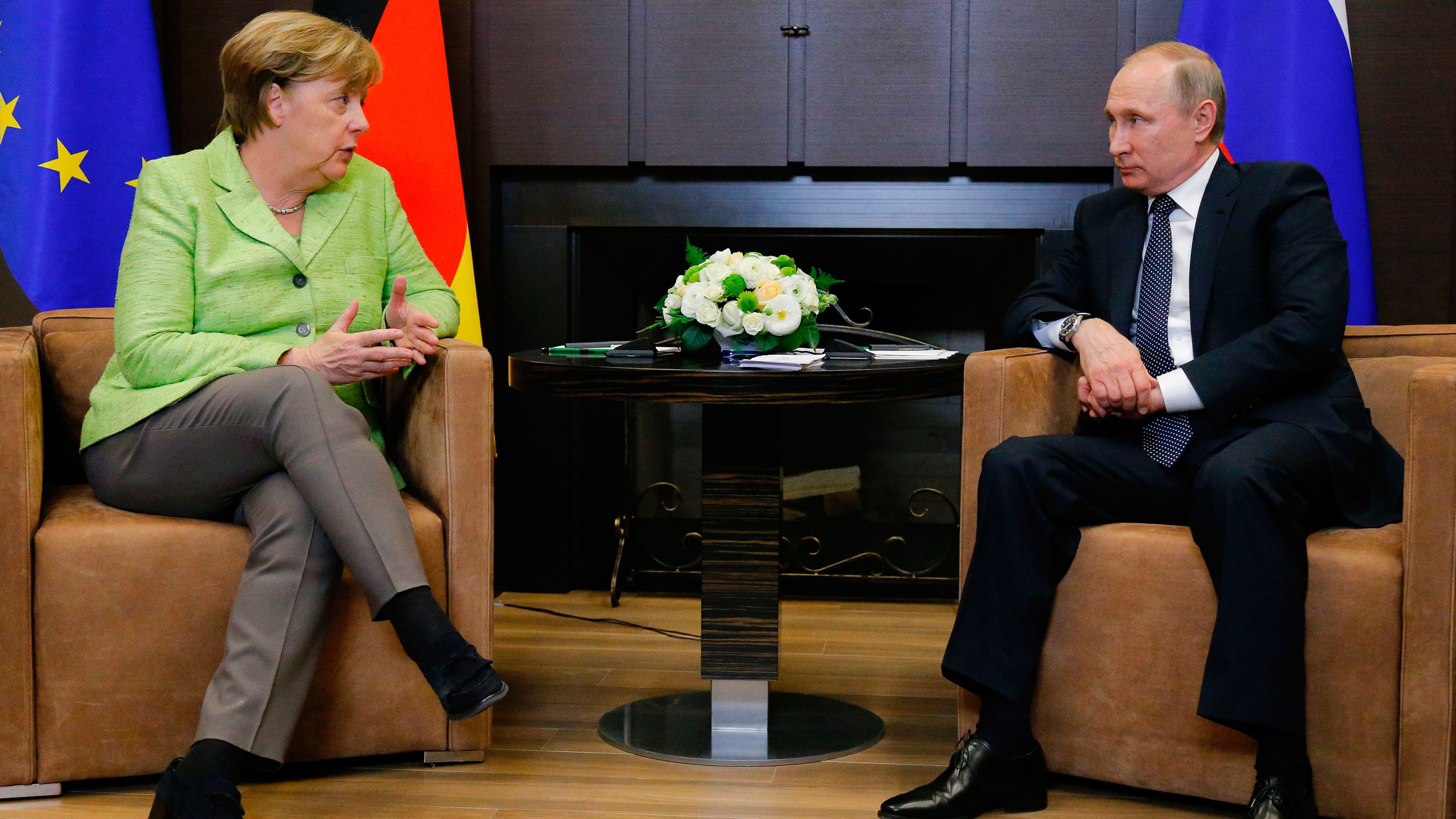 Merkel (L) with Putin at the Bocharov Ruchei residence in Sochi on Tuesday. 