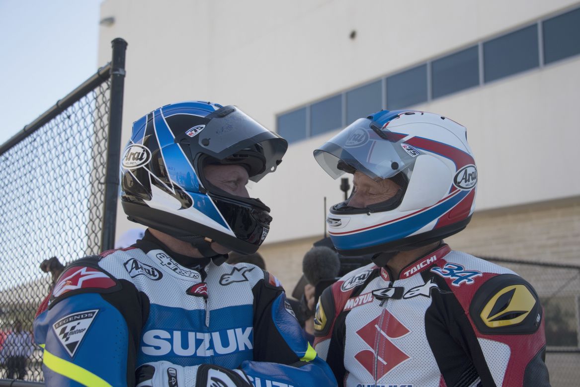 Americans Kenny Roberts Jr.  and Kevin Schwanz speak during "Suzuki honour lap" before the MotoGP race  in Austin, Texas. Roberts Jr. was recently inducted into the MotoGP Hall of Fame.