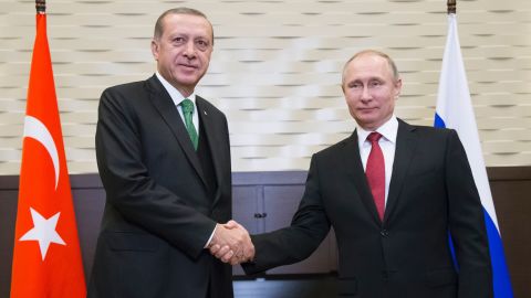 Russian President Vladimir Putin shakes hands with Turkish counterpart Recep Tayyip Erdogan during their meeting at the Bocharov Ruchei state residence in Sochi on May 3, 2017.