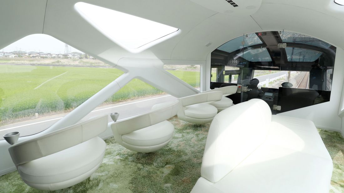 <strong>Observatory car: </strong>Plush-carpeted observatory cars at the front and rear of the train offer uninterrupted views of the Japanese countryside. 