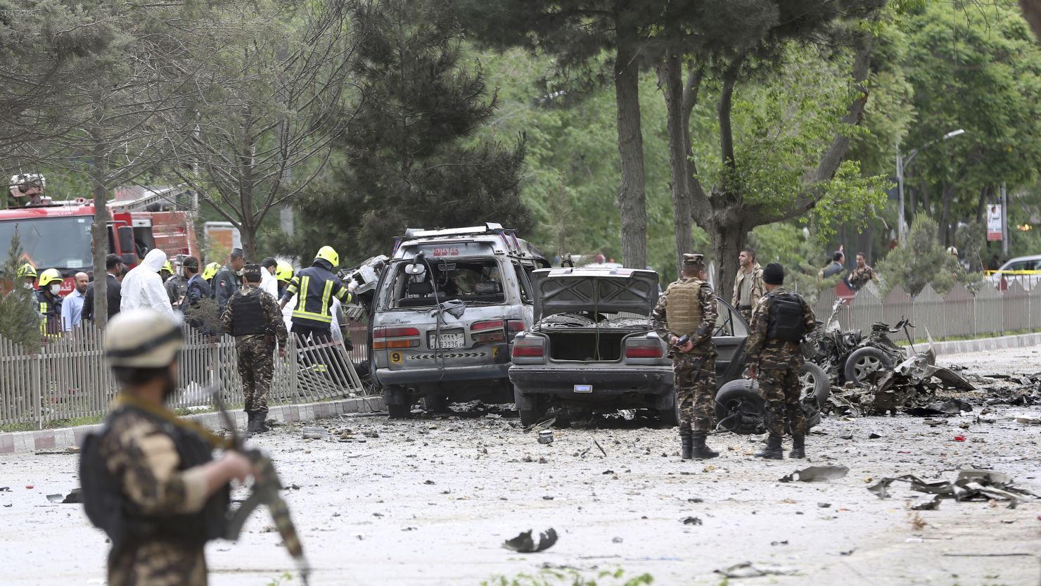 Security forces inspect at the site of a suicide attack in Kabul, Afghanistan, on Wednesday.