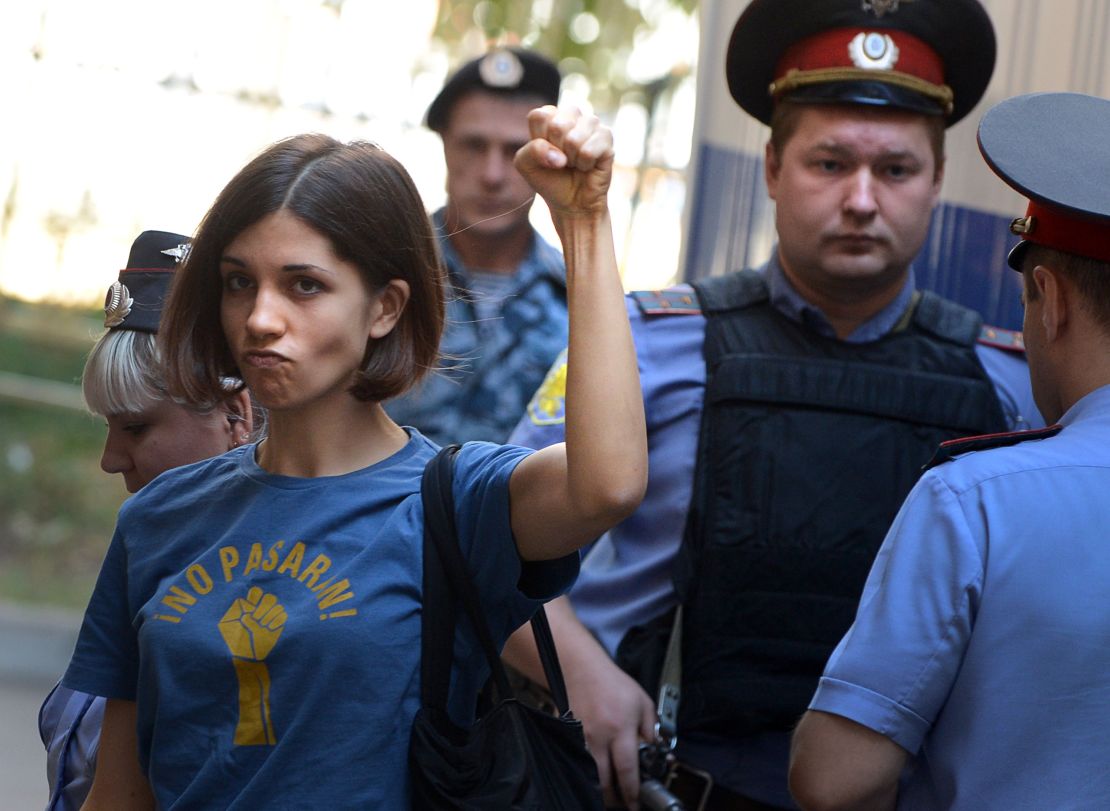 Member of female punk band "Pussy Riot" Nadezhda Tolokonnikova gestures before a court hearing in Moscow on August 8, 2012.