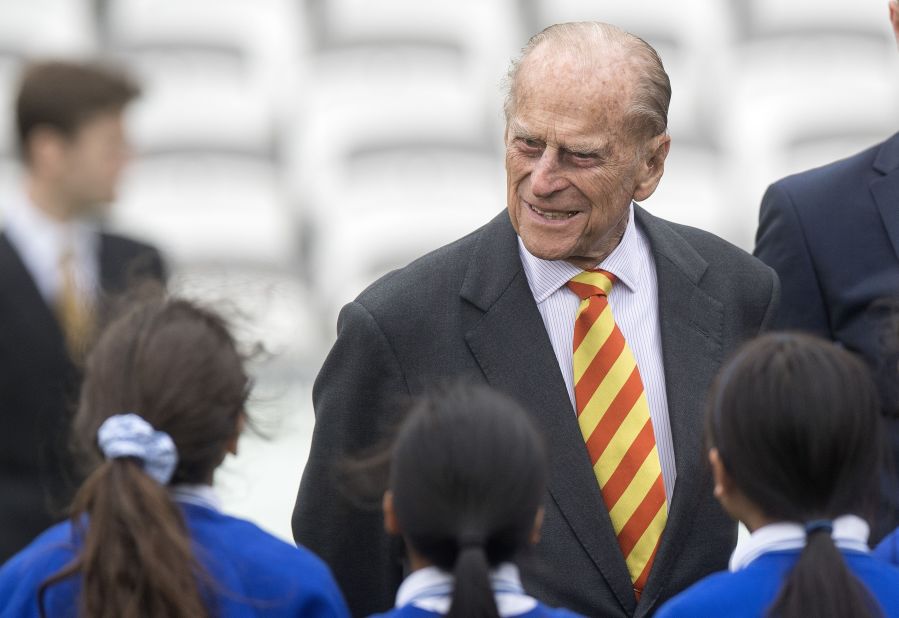 Prince Philip talks to schoolchildren in May 2017 during a visit to Lord's cricket ground in London. He opened the venue's new Warner Stand.