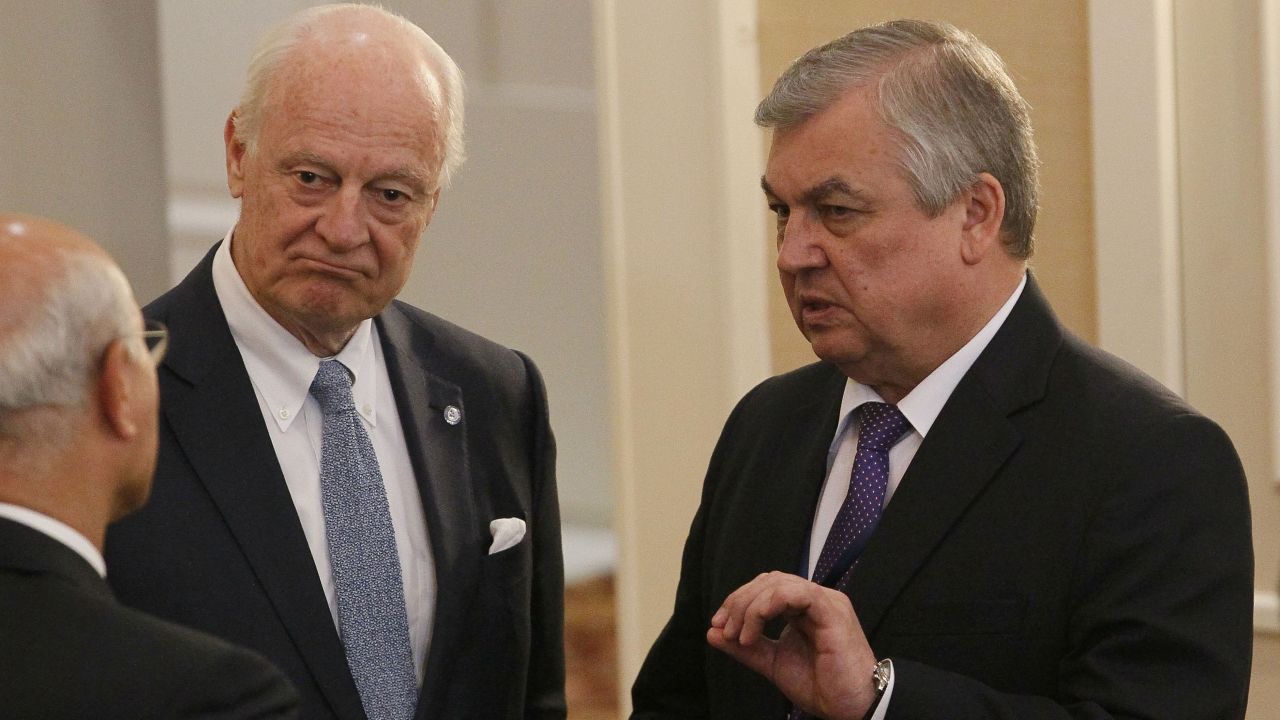 UN envoy Staffan de Mistura, left, and Russian mediator Alexander Lavrentyev confer Thursday.