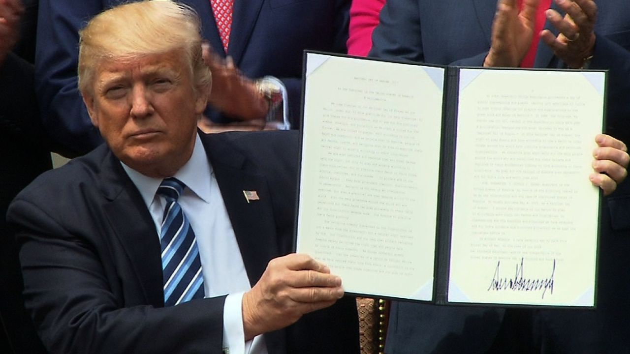 Trump signs executive order to &lsquo;vigorously promote religious 