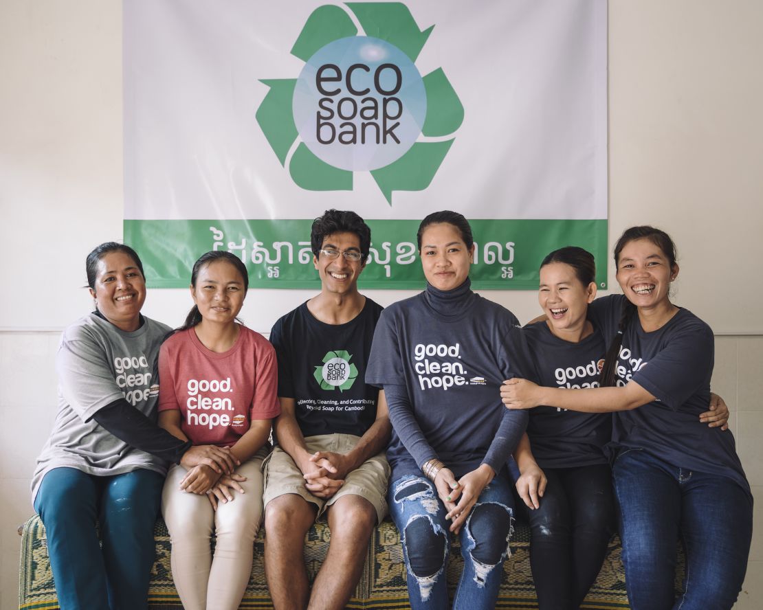 Lakhani shares a light moment with staff at Eco-Soap Bank--which employs local women