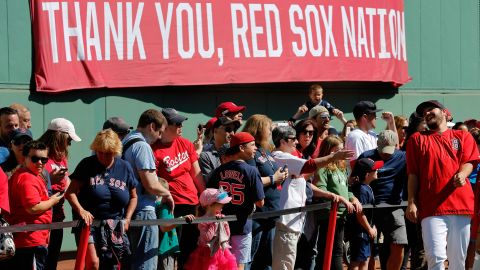 Fans line up to meet Boston Red Sox players at Fenway Park in Boston.