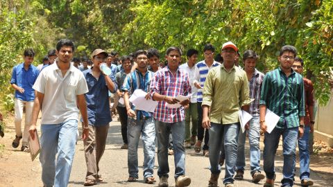 Students coming out of the exam centre after appearing in the JEE (Advanced) exam at Siddhartha Mahila Kalasala in Vijayawada on Sunday. 101Reporters