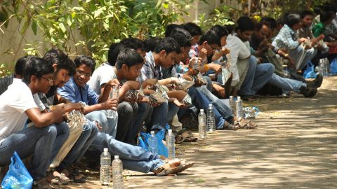 Students having their lunch after appearing in the JEE (Advanced) exam paper-1 at Siddhartha Mahila Kalasala in Vijayawada on Sunday. 101Reporters