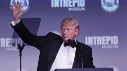 President Donald Trump gestures as he concludes his remarks during a dinner aboard the USS Intrepid, a decommissioned aircraft carrier docked in the Hudson River in New York, Thursday, May 4, 2017. The dinner was to help commemorate the 75th anniversary of the Battle of Coral Sea, a World War II naval battle fought by US and Australian force against the Japanese.