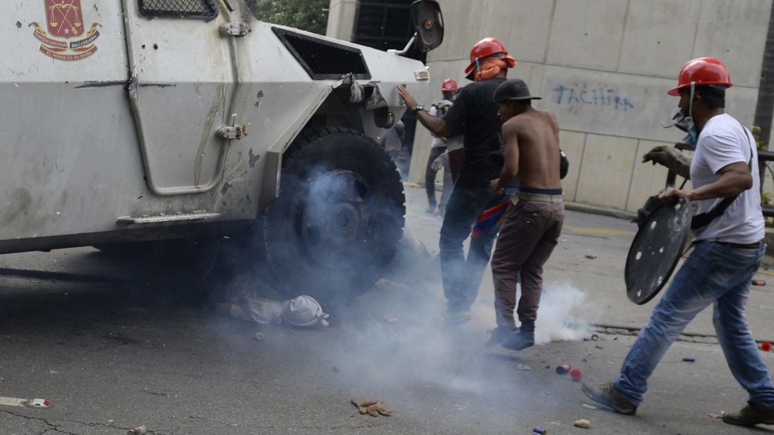 An armored National Guard vehicle <a href="http://www.cnn.com/2017/05/05/americas/venezuela-unrest-tank/" target="_blank">runs over a protester</a> in Caracas on Wednesday, May 3. The protester, 22-year-old Pedro Michell Yaminne, survived, his mother told CNN. Interior and justice minister Nestor Reverol told reporters that the "lamentable" incident was under investigation. He said that moments before Yaminne was run over, demonstrators hurled a Molotov cocktail at the armored vehicle, opened the side door and "brutally assaulted" the driver.