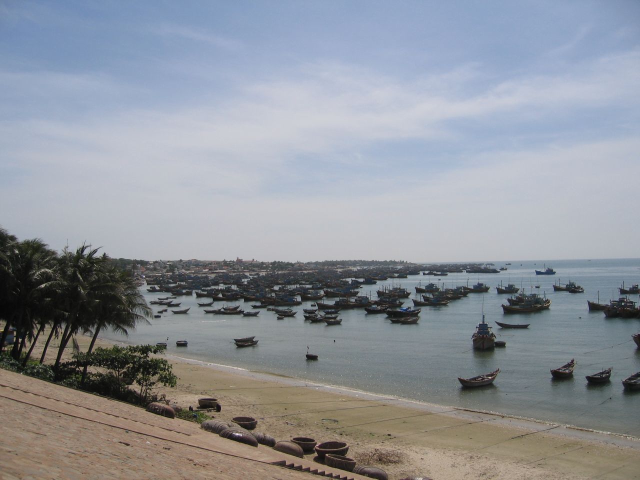 Boats docked at Mui Ne beach.