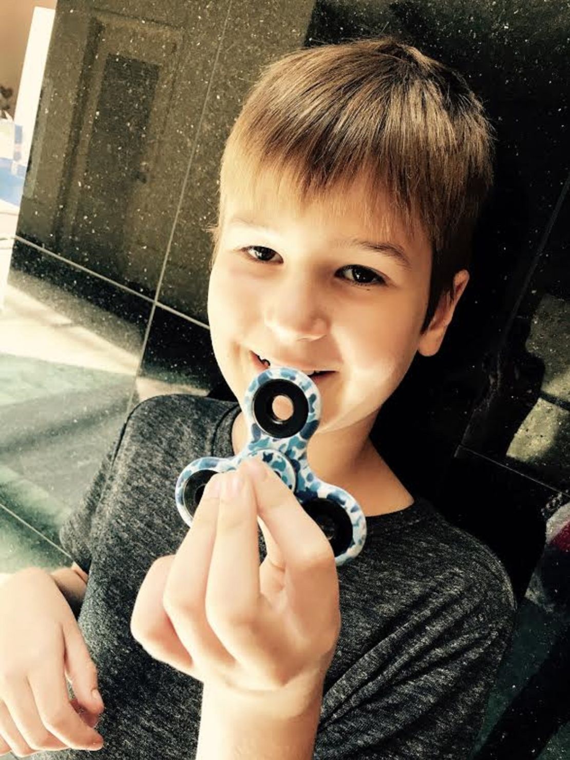 Alex Shivers shows off his camo-printed spinner. 