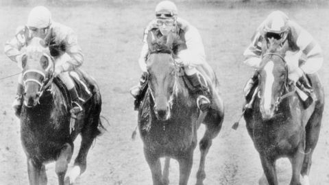 In her 1969 debut, Crump, center, keeps up with Mike Sorentino, left, and Craig Perret at Hialeah Park.