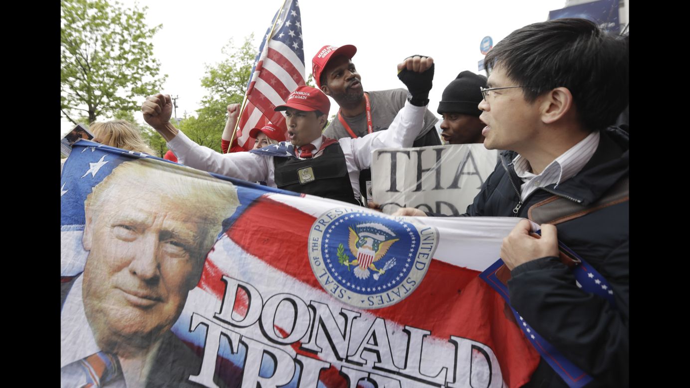 Trump supporters gather near the USS Intrepid before the gala in New York on Thursday, May 4. The gala marked the 75th anniversary of the Battle of the Coral Sea, a key World War II moment in which the American and Australian navies stopped Japanese advancement in the Pacific.