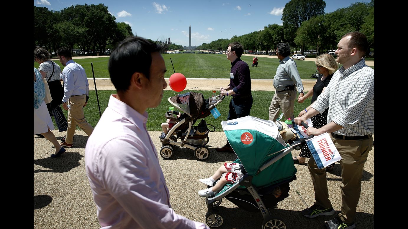 Parents push their children in strollers during a "Strolling Thunder" event in Washington on Tuesday, May 2. The event was designed to urge Congress to support policies that focus on young children and allow them to fulfill their potential.