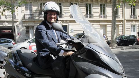 Francois Hollande, here after an official meeting, on his scooter in Paris in 2011.